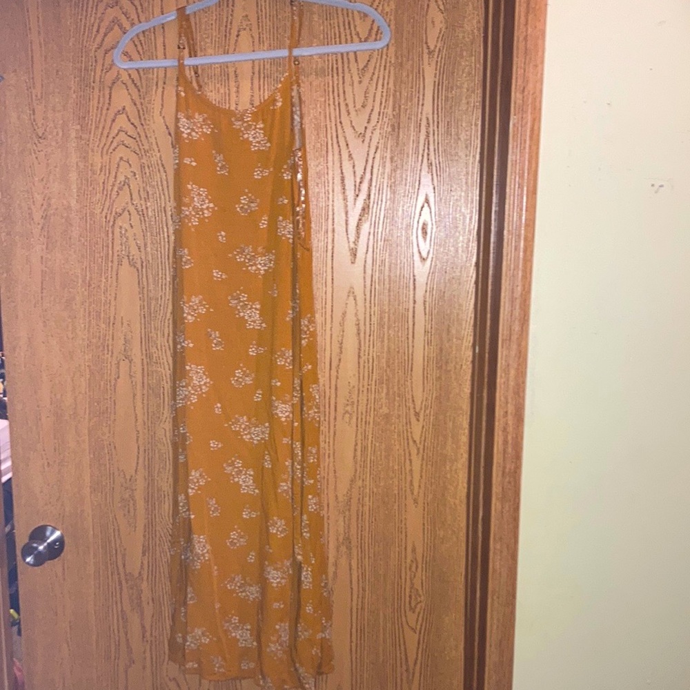 Yellowish orange sun/ spring dress with white floral print..